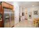 Kitchen with stainless steel refrigerator and pantry at 14423 Glendon Hall Ln, Charlotte, NC 28262