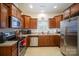 Modern kitchen featuring stainless steel appliances and ample cabinetry at 14423 Glendon Hall Ln, Charlotte, NC 28262