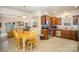 Eat-in kitchen featuring stainless steel appliances and wood cabinets at 14423 Glendon Hall Ln, Charlotte, NC 28262