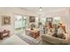 Living room with access to a private patio and neutral decor at 14423 Glendon Hall Ln, Charlotte, NC 28262