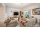 Cozy living room with sliding glass doors leading to a private patio at 14423 Glendon Hall Ln, Charlotte, NC 28262