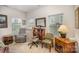Home office featuring a comfortable recliner and built-in desk at 14423 Glendon Hall Ln, Charlotte, NC 28262