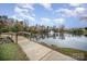 Peaceful pond with a wooden footbridge at 14423 Glendon Hall Ln, Charlotte, NC 28262