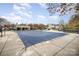 Community pool with safety cover and play area at 14423 Glendon Hall Ln, Charlotte, NC 28262
