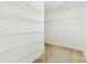Spacious walk-in closet with ample shelving and storage for organized living at 14423 Glendon Hall Ln, Charlotte, NC 28262