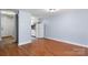 Simple dining area with hardwood floors and view of kitchen at 2705 North Center St # 74, Hickory, NC 28601