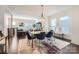 Bright dining room with marble table and blue chairs at 3801 Sky Haven Dr, Charlotte, NC 28209