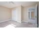 Bright bedroom with double doors and carpet at 5580 Berry Ridge Dr, Harrisburg, NC 28075