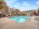 Relaxing community pool with plenty of lounge chairs at 884 Park Slope Dr, Charlotte, NC 28209