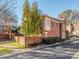 Side view of brick townhome, neatly landscaped at 884 Park Slope Dr, Charlotte, NC 28209