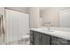 Bright bathroom with shower/tub combo and grey vanity at 1094 Herrons Ferry Rd, Rock Hill, SC 29730