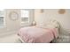 Charming bedroom with unique headboard and soft pink bedding at 1094 Herrons Ferry Rd, Rock Hill, SC 29730