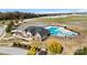 Aerial view of community pool with clubhouse and surrounding landscape at 1094 Herrons Ferry Rd, Rock Hill, SC 29730