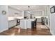 A chef's kitchen with stainless steel appliances, a large island with seating, and plenty of cabinets at 12023 Huntson Reserve Rd, Huntersville, NC 28078