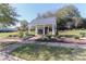 Community mail kiosk amidst manicured landscaping, featuring seating and convenient access for residents at 12023 Huntson Reserve Rd, Huntersville, NC 28078