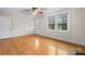 Bright bedroom with hardwood floors and access to exterior at 1235 10Th Ne St, Hickory, NC 28601