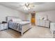 Cozy bedroom featuring a queen-sized bed, white furniture, and natural light, perfect for relaxation at 2005 Robyn Ave, Shelby, NC 28152