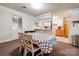 This dining room features a dark brown carpet and is connected to the kitchen at 2005 Robyn Ave, Shelby, NC 28152