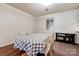 The dining room features paneled walls and a checkered tablecloth over a dark brown carpet at 2005 Robyn Ave, Shelby, NC 28152