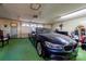 Garage featuring painted floors, white walls, and an automatic door at 2005 Robyn Ave, Shelby, NC 28152