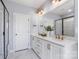 Bathroom with double sinks, granite countertop and black hardware at 2146 Barrowcliffe Nw Dr, Concord, NC 28027