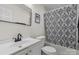 Clean bathroom, bathtub shower combo, and updated vanity at 2403 Mary Ave, Gastonia, NC 28052