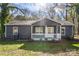 Dark gray house with white porch and yard at 2403 Mary Ave, Gastonia, NC 28052