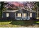 Gray house with white trim and a front porch at 2403 Mary Ave, Gastonia, NC 28052