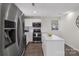 Modern kitchen with stainless steel appliances and island at 2403 Mary Ave, Gastonia, NC 28052