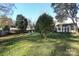 Spacious backyard with storage shed and patio area at 2701 Palm Ave, Charlotte, NC 28205