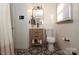 Updated bathroom with wood vanity, patterned tile floor at 2701 Palm Ave, Charlotte, NC 28205