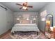 Bright bedroom with a king-size bed and en-suite bathroom at 2701 Palm Ave, Charlotte, NC 28205