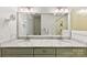 Clean bathroom with double vanity and large mirror at 548 Summerfield Pl, Belmont, NC 28012