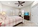 Charming bedroom with a double bed and ceiling fan at 548 Summerfield Pl, Belmont, NC 28012