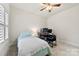 Small bedroom with workspace and ceiling fan at 548 Summerfield Pl, Belmont, NC 28012