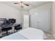 Bedroom with desk, double doors and ceiling fan at 548 Summerfield Pl, Belmont, NC 28012