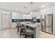 Modern kitchen with stainless steel appliances and granite counters at 548 Summerfield Pl, Belmont, NC 28012