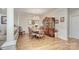 Formal dining room with hardwood floors and decorative china cabinet at 5635 Ballinard Ln, Charlotte, NC 28277