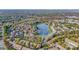 Beautiful aerial view of neighborhood with serene lake and autumnal foliage at 7943 Oratorio Pl, Charlotte, NC 28270