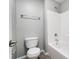 Bathroom featuring a gray wall and a white shower-tub combination at 7943 Oratorio Pl, Charlotte, NC 28270