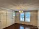 Dining room with hardwood floors and a vintage light fixture at 8350 Nc Hwy 90 E Hwy, Stony Point, NC 28678