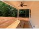 Covered back porch with ceiling fan, overlooking spacious backyard at 9130 Dulwich Dr # Ken0079, Charlotte, NC 28215