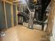 Unfinished basement utility area showcasing the home's mechanicals, including HVAC system at 9130 Dulwich Dr # Ken0079, Charlotte, NC 28215