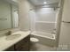 Clean bathroom featuring a shower-tub combo and modern vanity with undermount sink at 9130 Dulwich Dr # Ken0079, Charlotte, NC 28215