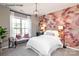 Bright bedroom showcasing a striking accent wall, window bench and modern lighting at 9130 Dulwich Dr # Ken0079, Charlotte, NC 28215