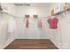 Walk-in closet with wire shelving and ample hanging space at 9130 Dulwich Dr # Ken0079, Charlotte, NC 28215