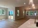 Open living area with natural light and modern fixtures at 9130 Dulwich Dr # Ken0079, Charlotte, NC 28215