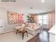 Cozy living room with stylish decor, hardwood floors, and abundant natural light at 9130 Dulwich Dr # Ken0079, Charlotte, NC 28215