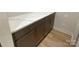 Mud room with custom cabinets, quartz countertops and durable flooring at 9130 Dulwich Dr # Ken0079, Charlotte, NC 28215