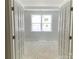 Unfinished room space with tray ceilings and french doors at 9130 Dulwich Dr # Ken0079, Charlotte, NC 28215